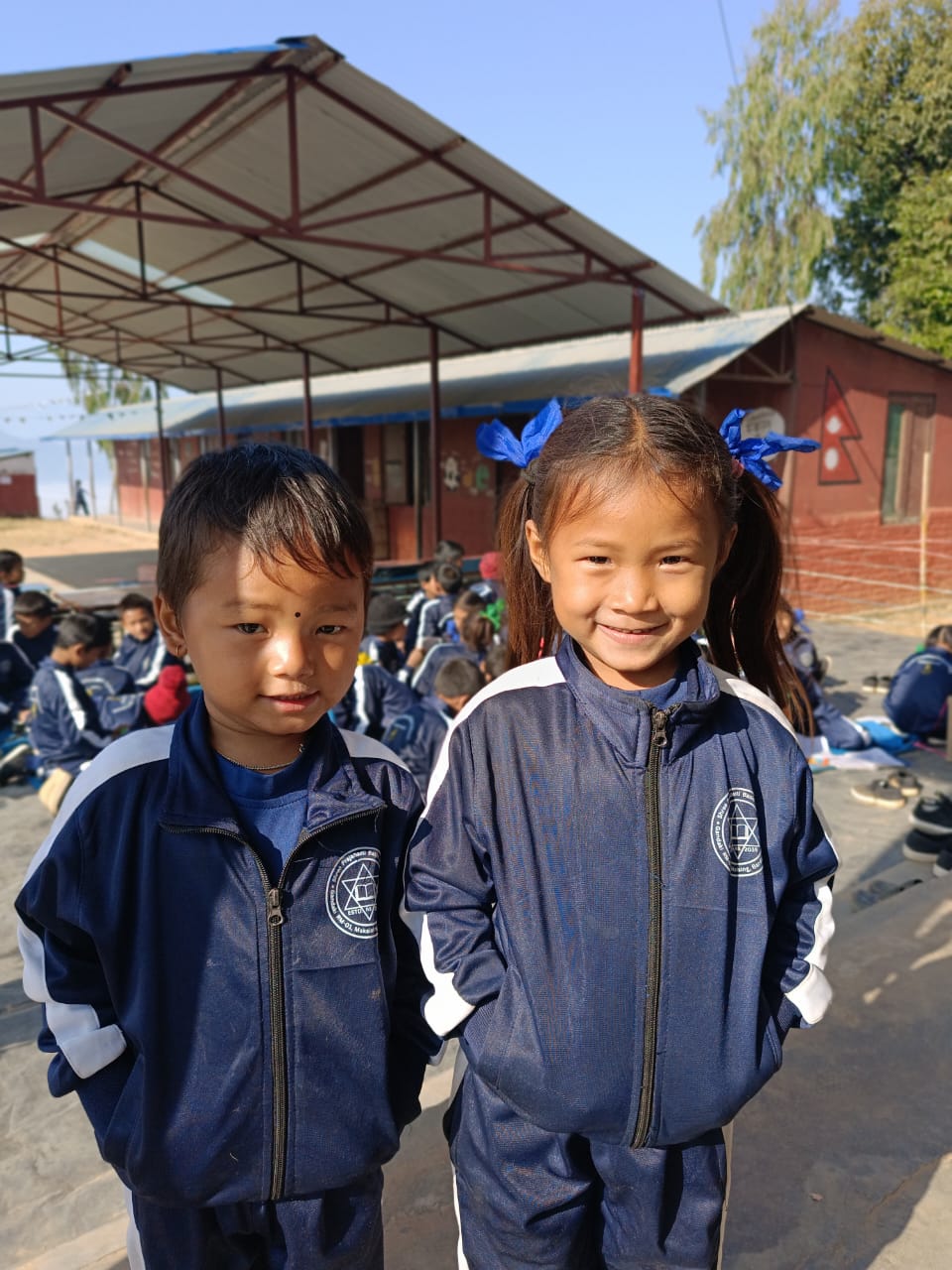DISTRIBUTION OF TRACK SUITS & SCHOOL SHOES & SOCKS